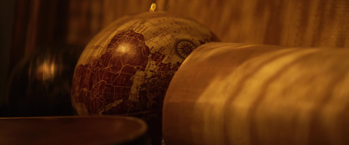 Globe moves back and forth as shadows move over it