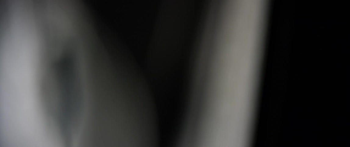 The arm of a metronome swings back and forth