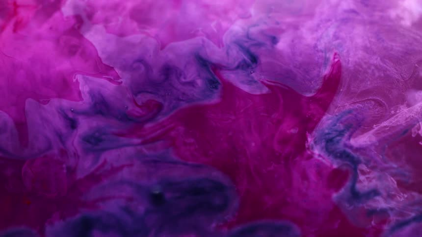 The ink mixes around in a design