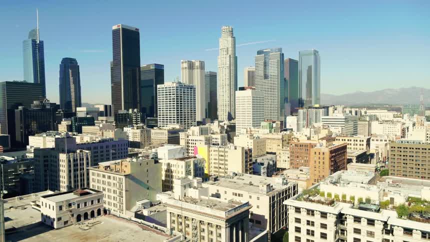 Big city skyline with tall buildings and skyscrapers on a sunny day