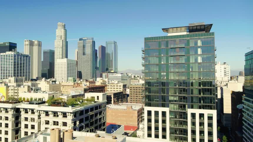 Skyscrapers stand close together in a downtown area