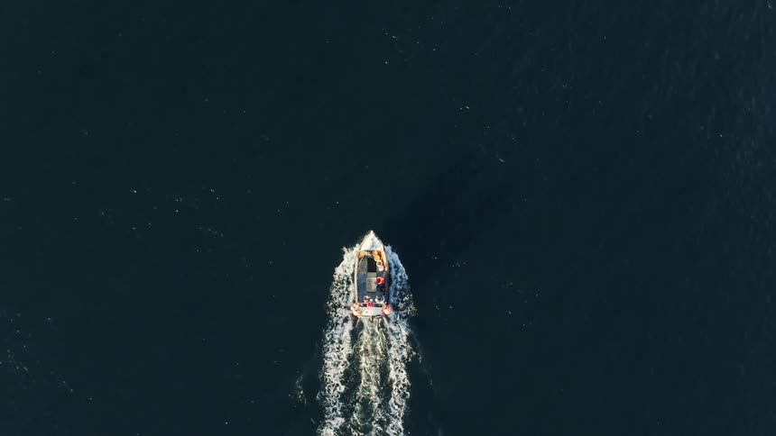 Small fishing boat sailing on the ocean