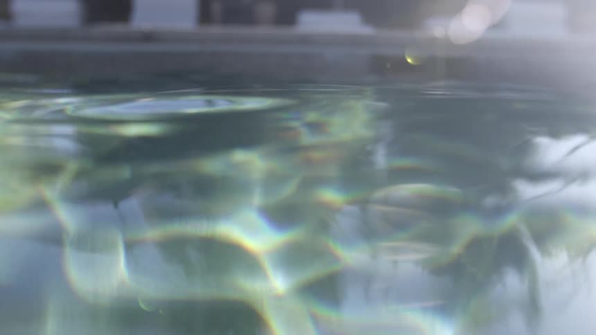 Water shimmers in a swimming pool