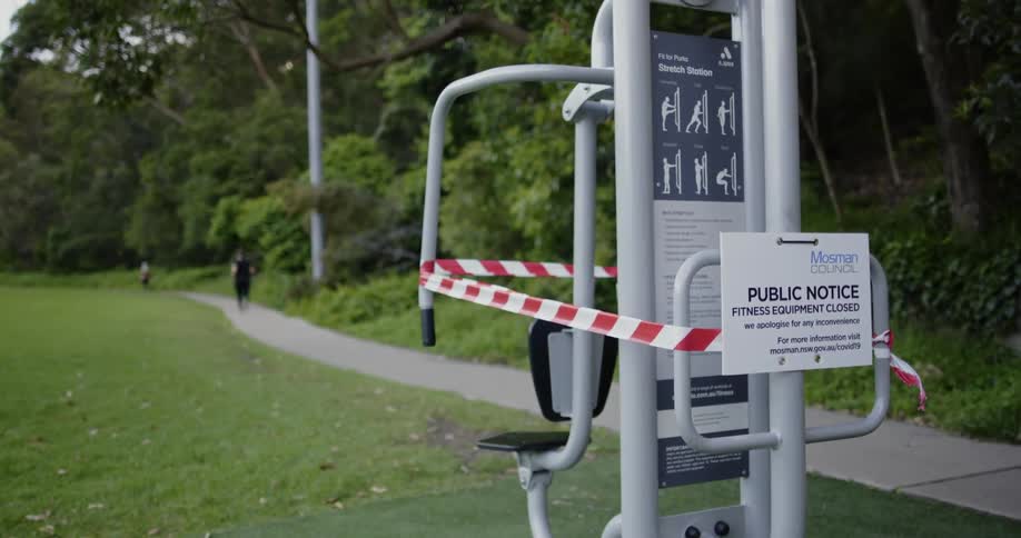 The exercise equipment is cautioned off in the park