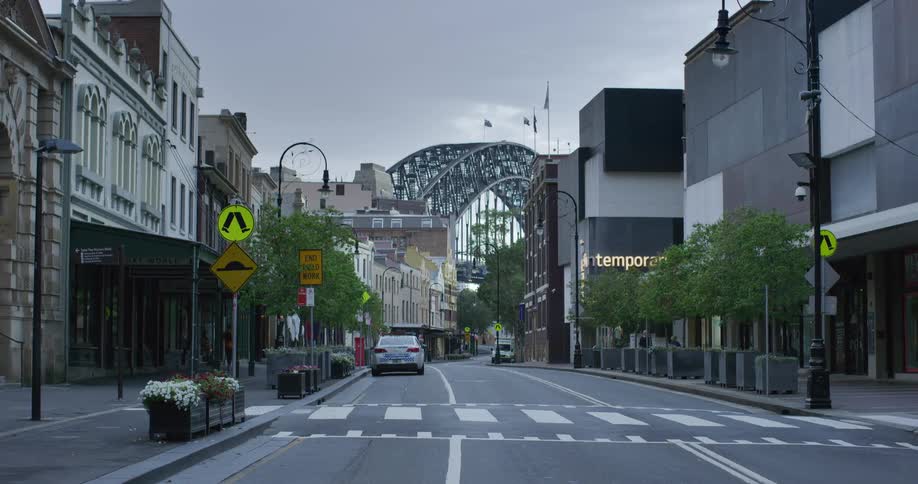 A city street with no traffic on a cloudy day