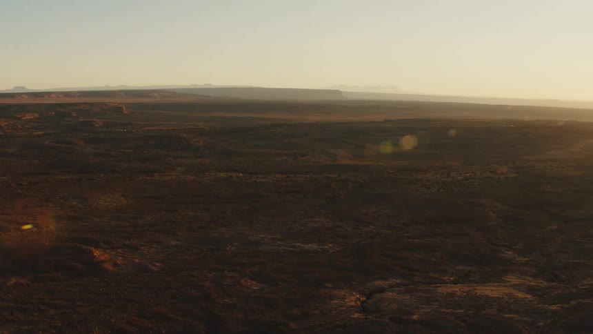 The vast plain is covered with green