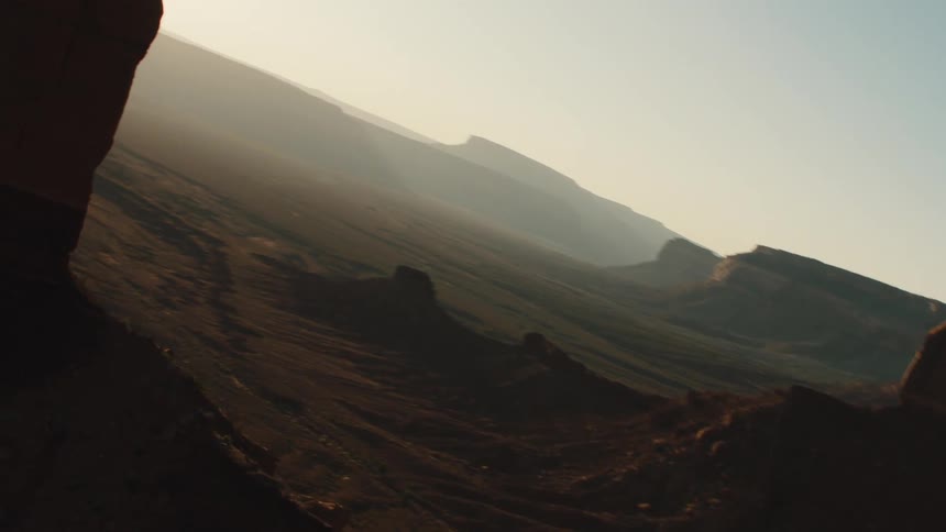 Aerial view of desert mesas and hoodoos