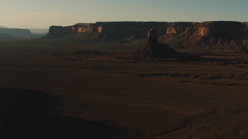 Flat desert gives way to a canyon