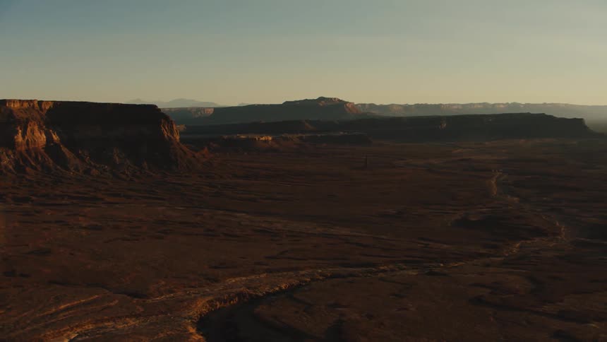 The barren badland landscape during the day