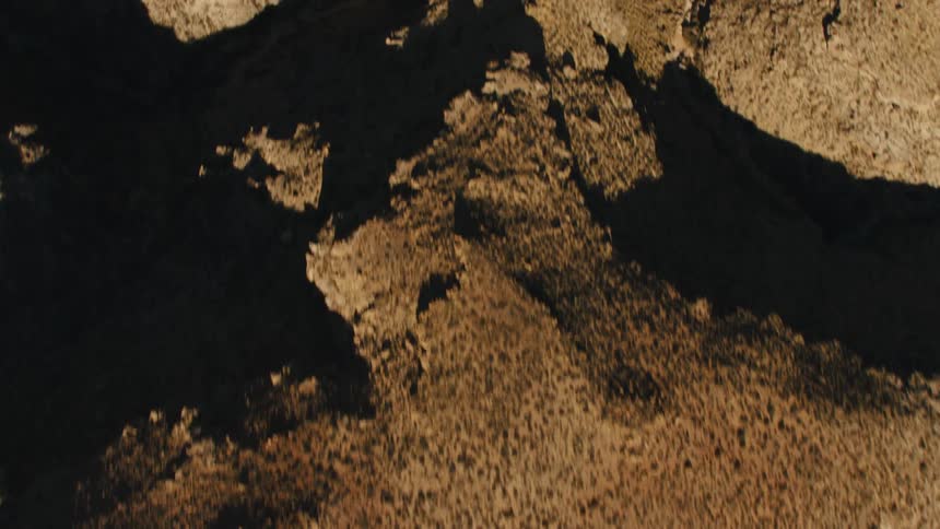 Rocky ravines cut through a flat rocky area
