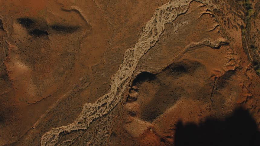 Top down aerial view of geological formations in the badlands desert
