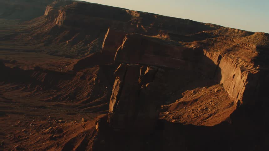The cliff gives off shade to parts of the canyon