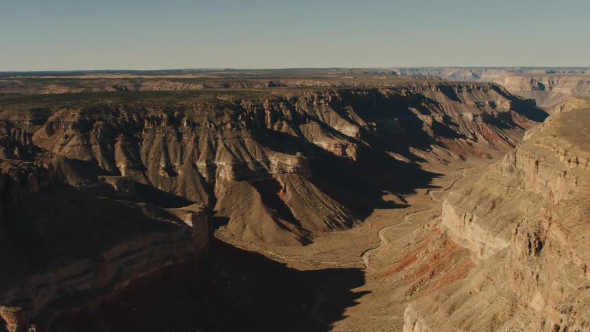 Aerial view of a canyon between mesas in the desert