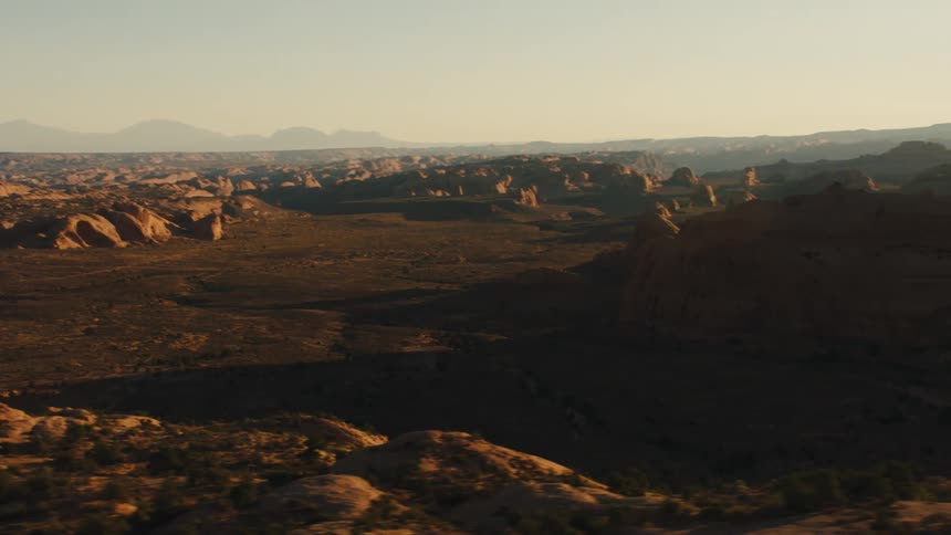 The tall hills give shade to the land below
