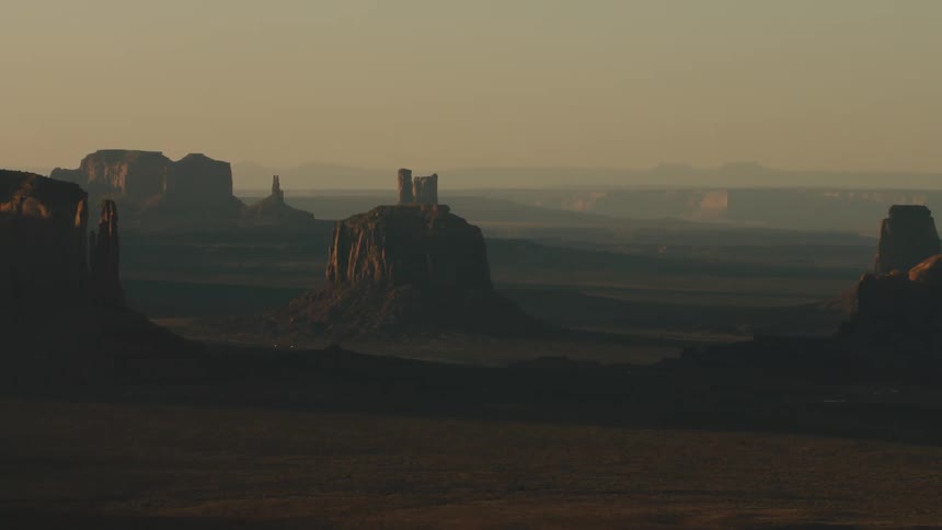 Geological formations in a foggy badland