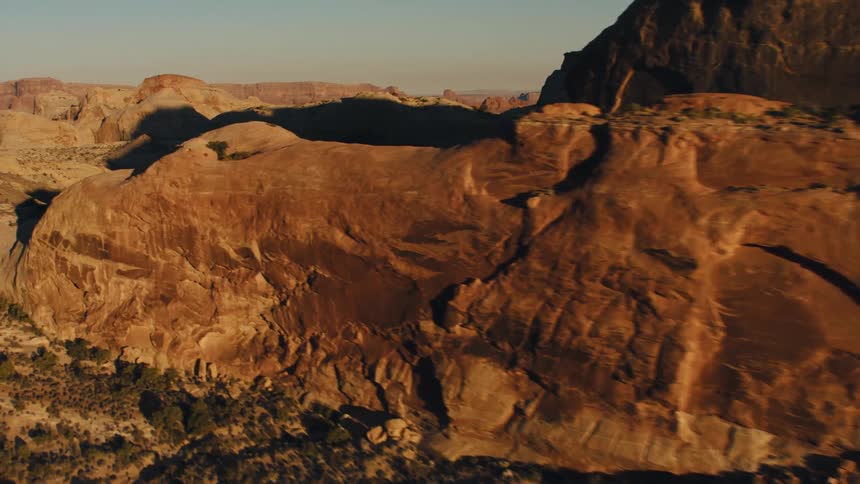 A view of a canyon is displayed during dusk