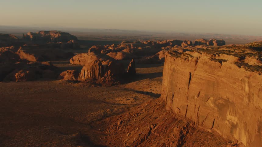 The canyon walls are tall near the desert