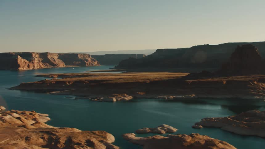 Cliffs overlook a deep blue lake
