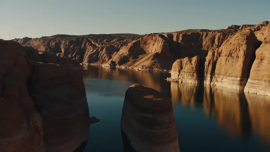 The water is calm in the canyon