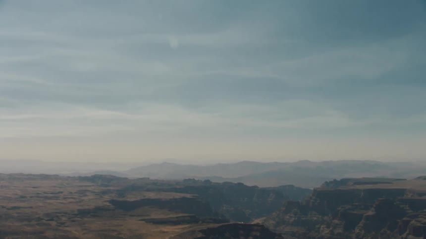 The fog is covering the large canyon