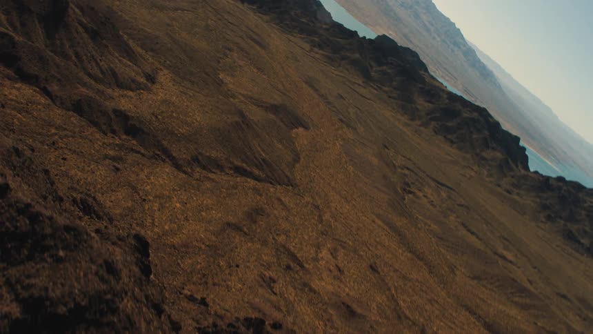 A river sprawls through a rocky valley