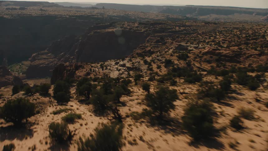 Aerial view of a field canyons and a valley
