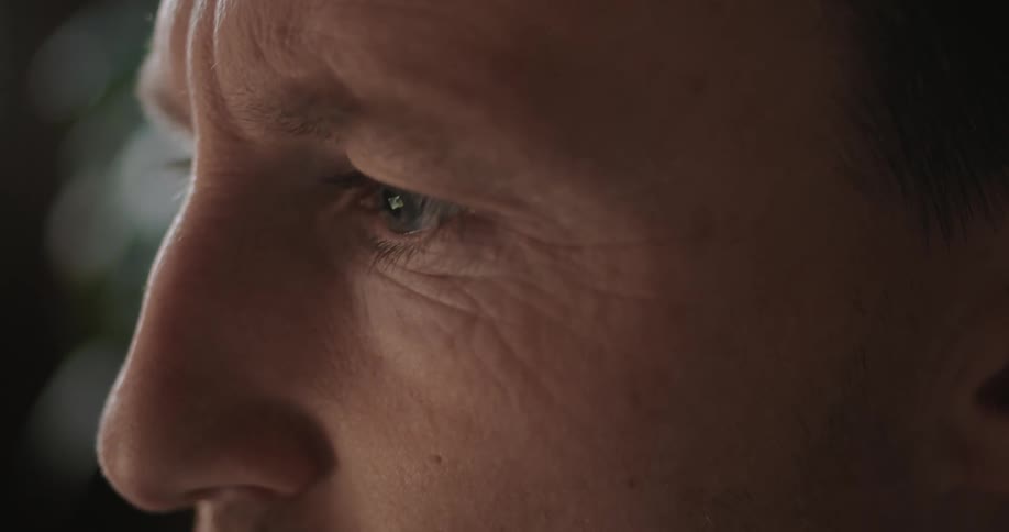 Very close up shot of a man’s face