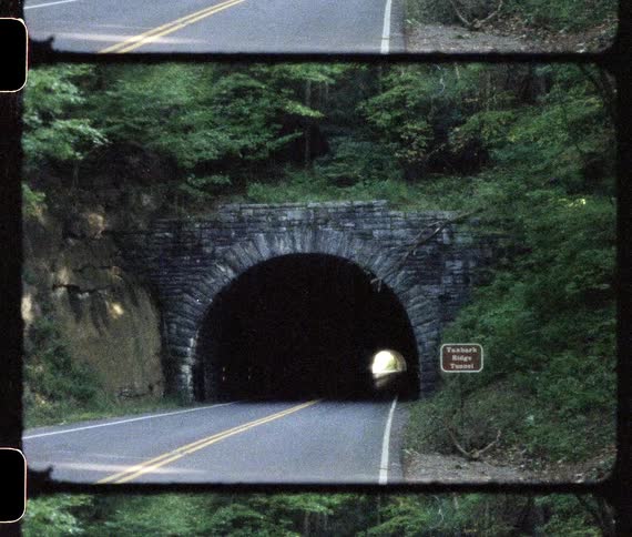 Film footage of a tunnel and the road