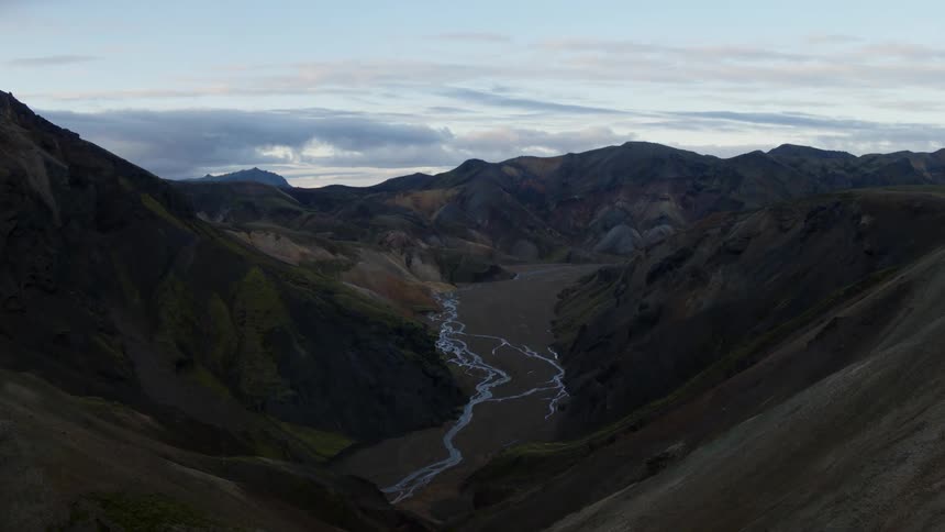 A small stream runs through the mountain