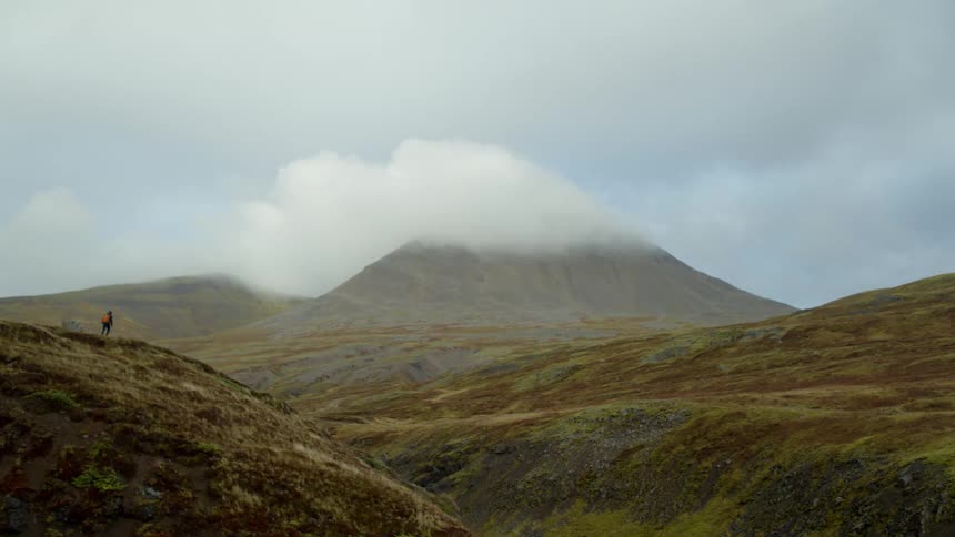 A person hiking through the hills