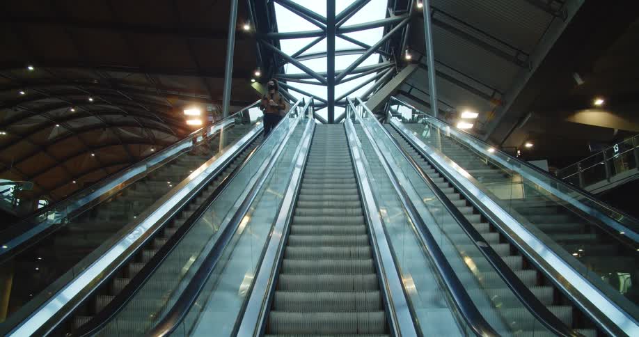 The escalator is empty going up