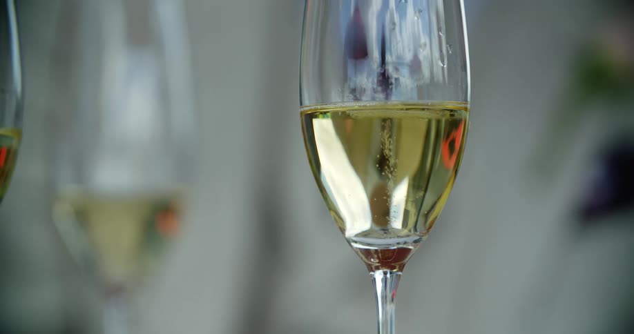 Bubbles rise in the glass