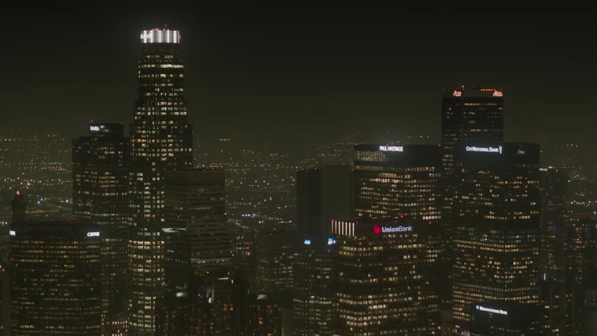 An aerial view of city skyline at night