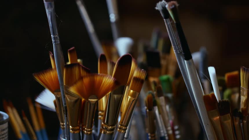 Close up of assorted paint brushes