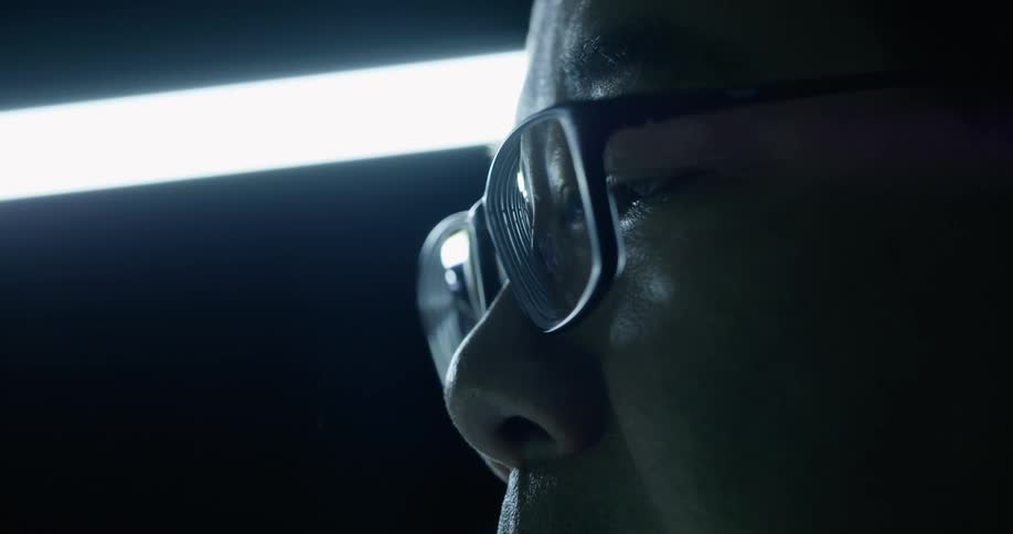 Man with glasses stare at something in front of him