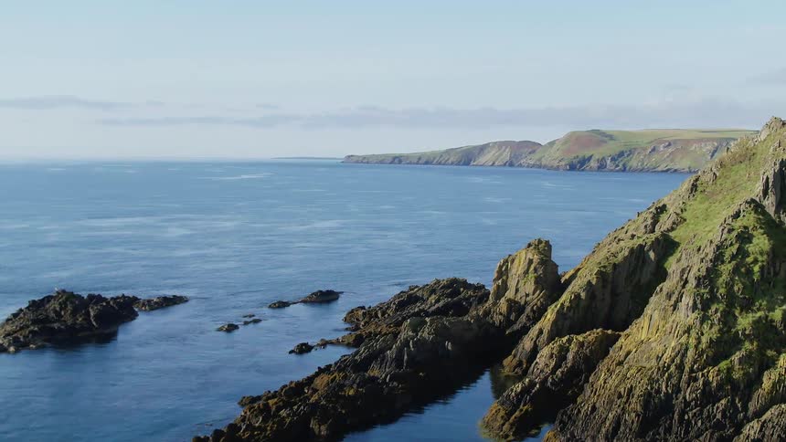 Aerial view of cliffs in the coast next to the ocean