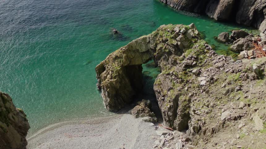 The water is blue by the shore