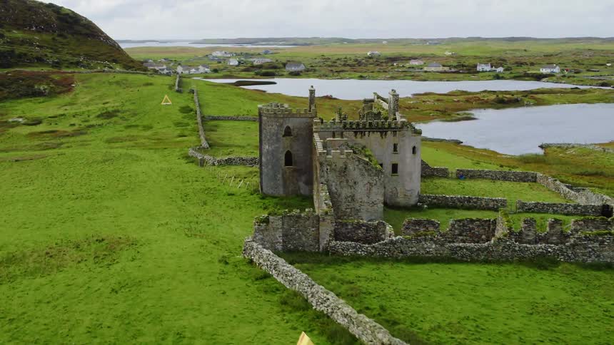 Ruins of a castle in the highlands near lakes