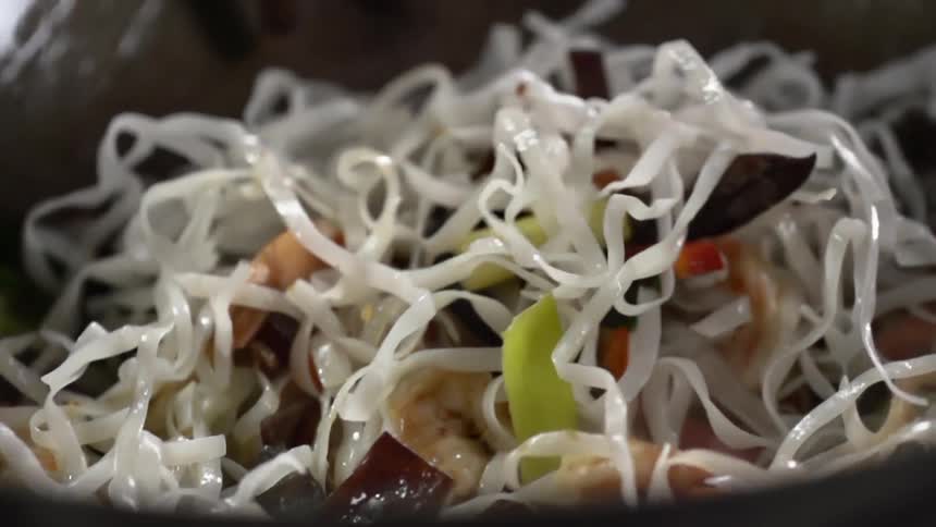 Chopsticks toss the asian food