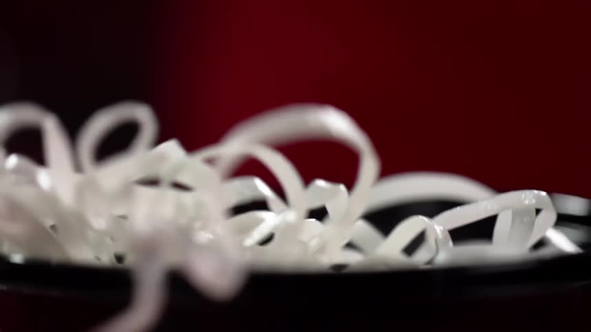 Noodles being put in to a pan