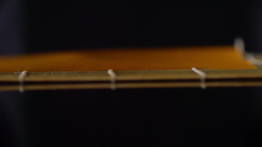 A wrapper on a sushi mat
