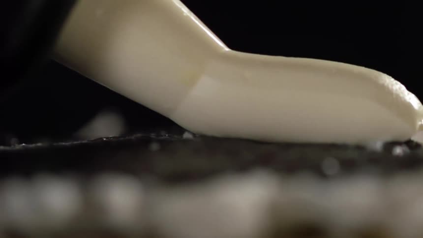 Icing coming out of a piping bag