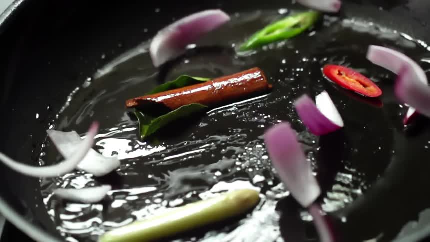 Vegetables are sauteed in a pan with oil