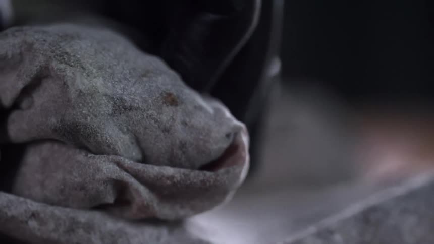 A person rolls a towel up
