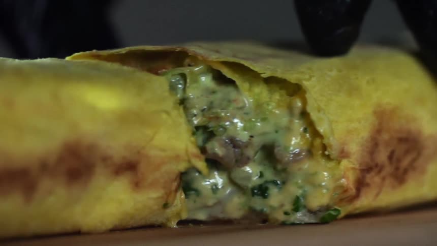 A person separates a wrap