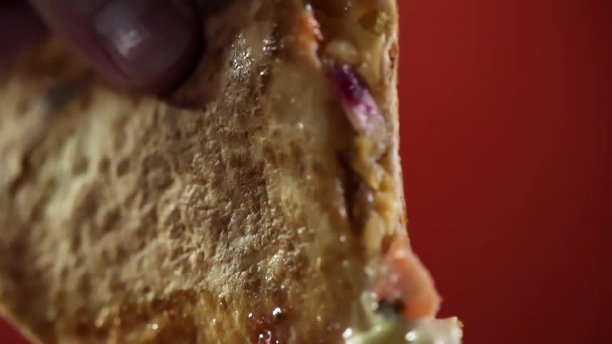 A person setting a sandwich down