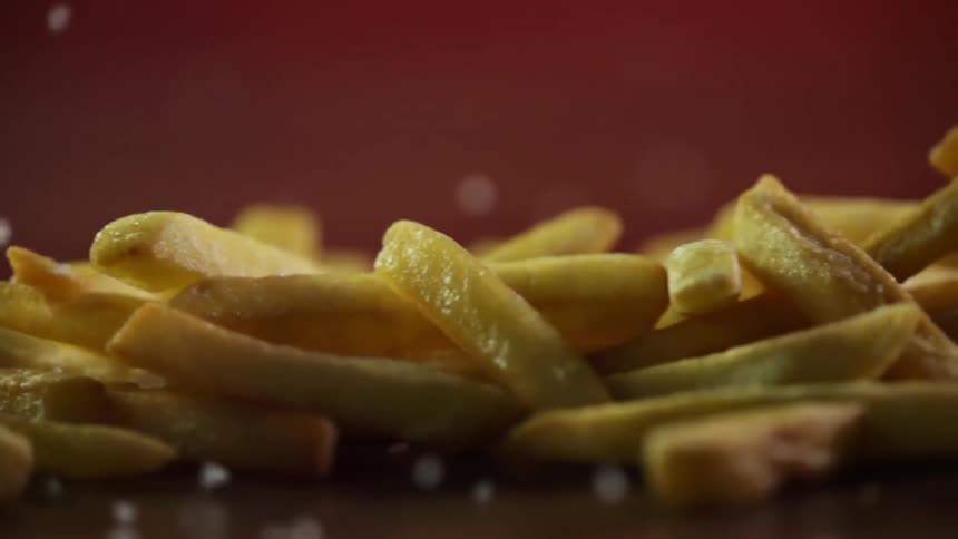 French fries are being added salt to