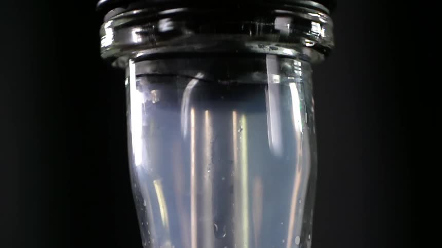 A glass base with smoke inside