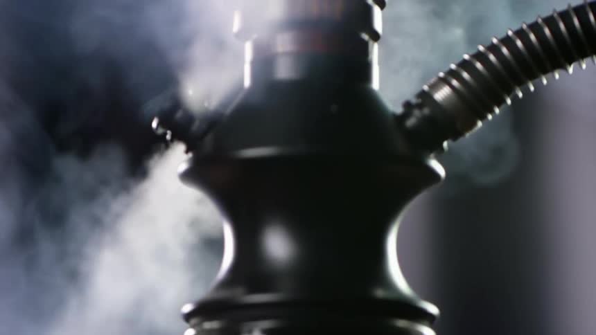 The hookah is spraying steam from a valve