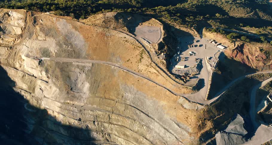 Aerial view of cars parked at the top of a canyon